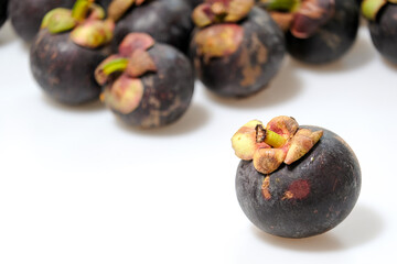 Close-Up Of Mangosteen Fruits On Table