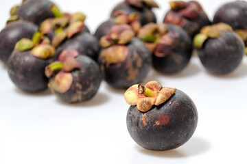 Close-Up Of Mangosteen Fruits On Table