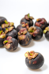 Close-Up Of Mangosteen Fruits On Table