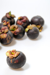 Close-Up Of Mangosteen Fruits On Table