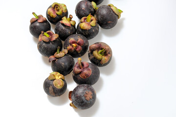 Close-Up Of Mangosteen Fruits On Table