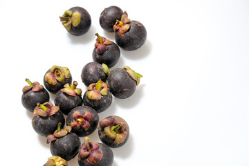 Close-Up Of Mangosteen Fruits On Table