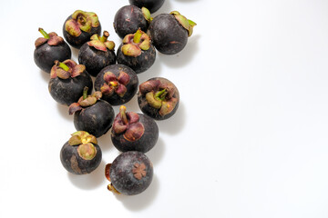 Close-Up Of Mangosteen Fruits On Table