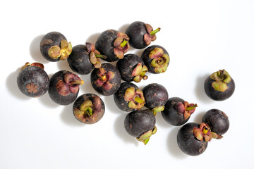 Close-Up Of Mangosteen Fruits On Table