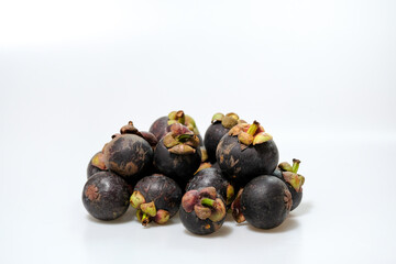 Close-Up Of Mangosteen Fruits On Table