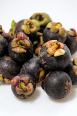 Close-Up Of Mangosteen Fruits On Table