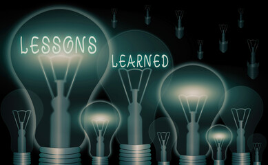 Text sign showing Lessons Learned. Business photo showcasing experiences garnered from understanding the activity