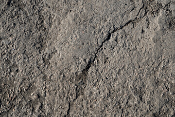 Background image of cracked concrete slab surface