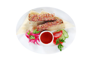 Grilled sausage of chicken minced meat with seasonings. A dish with a flatbread on a white plate. Copy of the space. Top view.