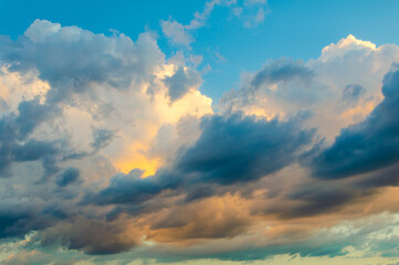 Fototapeta na wymiar Storm clouds lit by the morning sun.