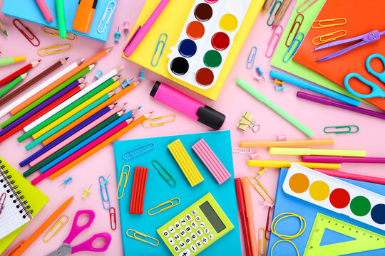 Different School Supplies On Pink Background