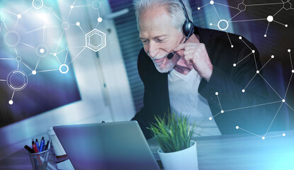 Obraz premium Senior male helpline operator in headset; light effect