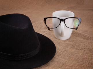 Happy fathers day concept. Design with hat and glasses on a glass. Template for greeting card, banner, flyer, invitation, congratulations, poster design.