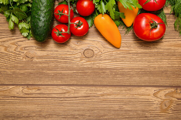 ripe raw vegetables on a wooden board. View from above. space for text