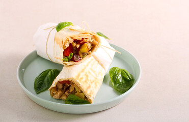 Chicken, zucchini and tomato rolls, served