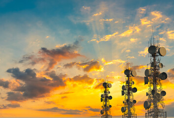telecommunication tower at sunset sky background