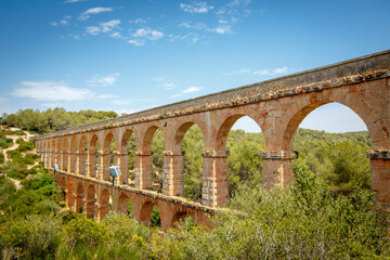 Fototapeta na wymiar Beautiful view of roman Aqueduct Pont del Diable in Tarragona