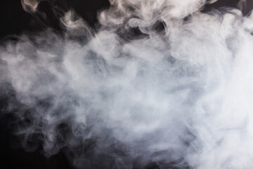 Cigarette smoke on a black background