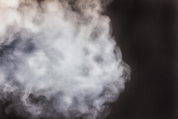 Cigarette smoke on a black background