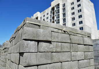 Fototapeta na wymiar Concrete blocks stacked on top of each other, construction of a new building.