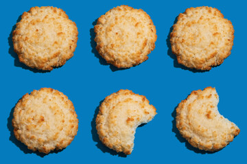 Bitten coconut cookies as pattern background