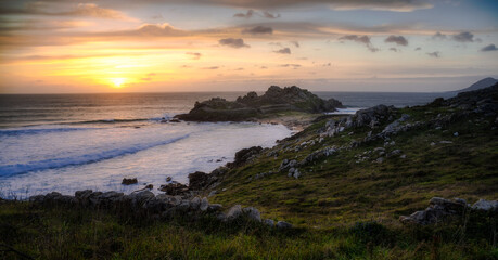 Obraz premium Ruins of Castro de Baroña during a beautiful sunset in the coast of Galicia