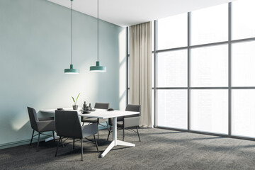 Panoramic blue dining room corner, grey chairs