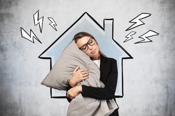 Businesswoman with pillow sleeping at home