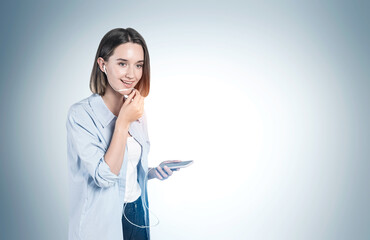 Smiling teen girl talking on smartphone, mock up