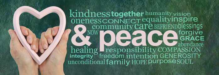 Love and Peace Campaign Word Cloud - Female hands holding a pink heart frame beside a & PEACE word...