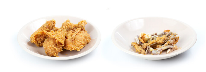 Fried chicken on a plate, compare before and after eating. isolated on white background
