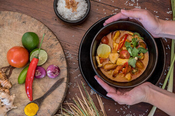 Waiter Serving Food at Restaurant. Cropped image of waiter serving soup