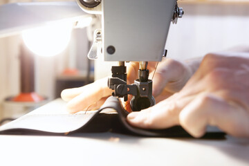 Close up of professional sewing machine for leather work.