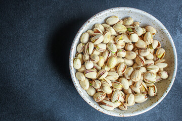 pistachios
Menu concept serving size. food background top view copy space for text
keto or paleo diet
organic healthy eating