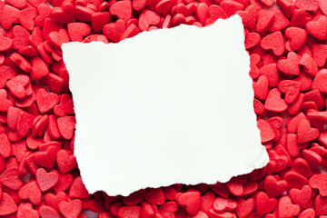 Red heart shapes candy, closeup.