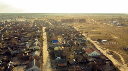 top view of the village: houses, roads, streets. In the background is the horizon. Zarichne village, spring