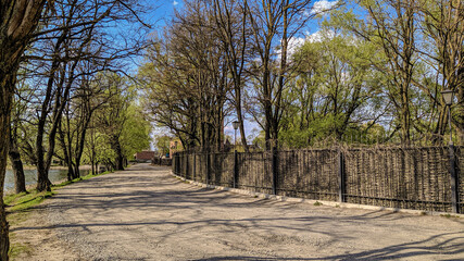 road near Radomysl castle in spring afternoon, Ukraine