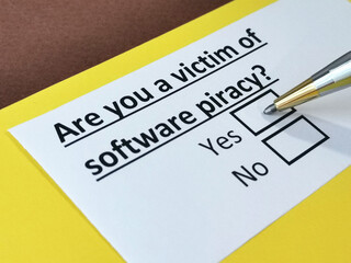 Obraz premium One person is answering question about software piracy.