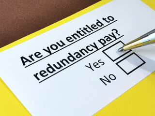 Obraz premium One person is answering question about redundancy pay.