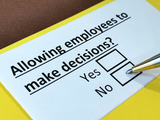 Obraz premium One person is answering question about right of employees in making decisions.