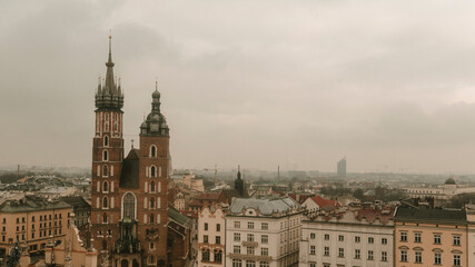 Fototapeta na wymiar Skyline of the historic center of Krakow on a cloudy day. Poland panorama landscape. Space for text