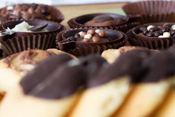 The morning at home begins with a sweet breakfast. Baked biscuits with chocolate and pralines and horseshoes served on a tray.