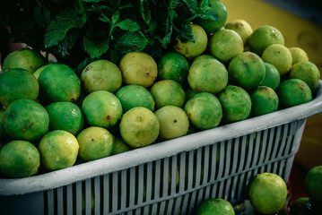 lime green and fresh mint for cocktails in the market 1