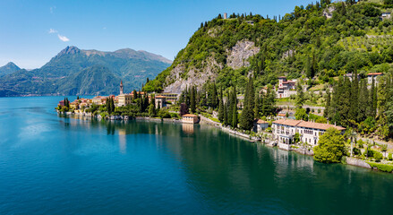 Fototapeta na wymiar Aerial view of the village of Varenna and Villa Monastero on Lake Como, Italy