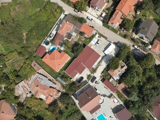 Top View of Red House Roofs in a Small Village