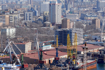 Fototapeta na wymiar City infrastructure. View at sea port. Vladivostok, Primorsky Krai (Primorye), Far East, Russia.