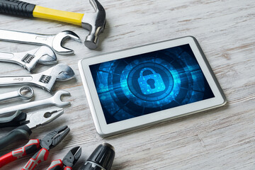 Web security and technology concept with tablet pc on wooden table © adam121