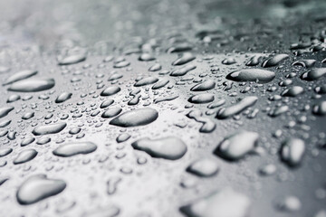 Realistic vector illustration of raindrops on windows and water droplets on glass In the silver background