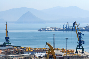 Industrial cityscape. View at the sea port and Nakhodka bay of Japan sea. Nakhodka, Primorsky Krai (Primorye), Far East, Russia.