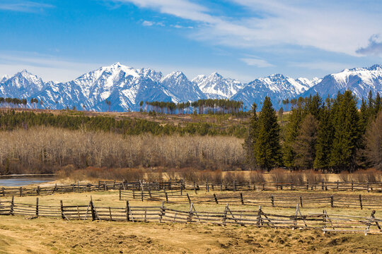the Irkut river in the Tunka valley in spring against the background of the Sayan mountains